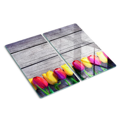 Üveg vágódeszka Tulipánok fa háttéren