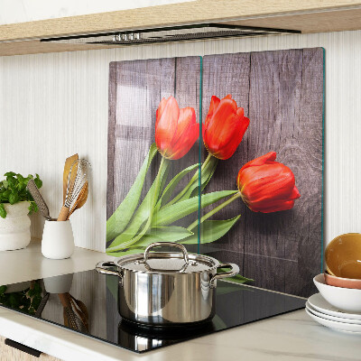 Üveg vágódeszka Tulipánok fa háttéren