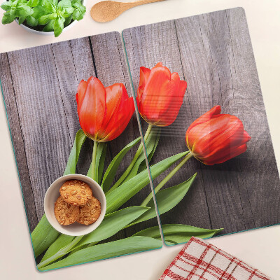 Üveg vágódeszka Tulipánok fa háttéren