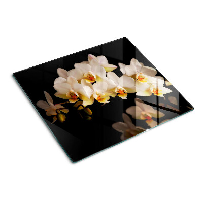 Üveg vágódeszka Orchideák fekete háttéren
