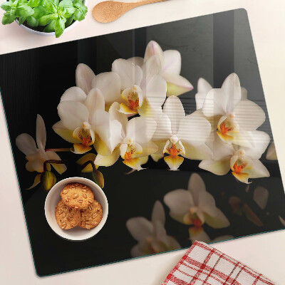 Üveg vágódeszka Orchideák fekete háttéren