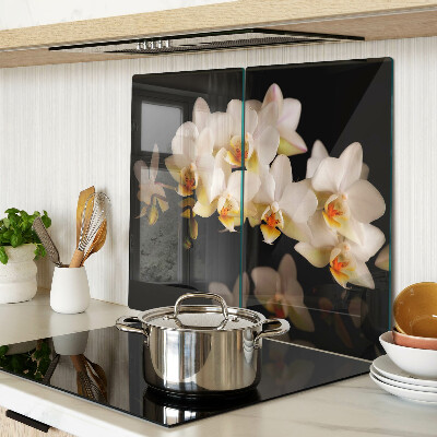 Üveg vágódeszka Orchideák fekete háttéren