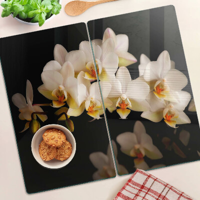 Üveg vágódeszka Orchideák fekete háttéren
