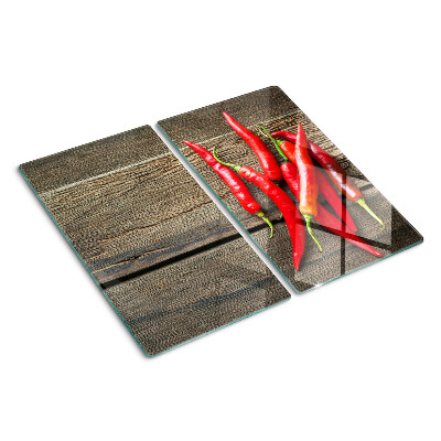 Üveg vágódeszka Chili paprika fa háttéren
