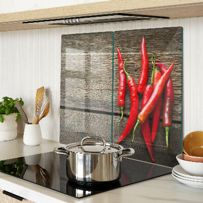 Üveg vágódeszka Chili paprika fa háttéren