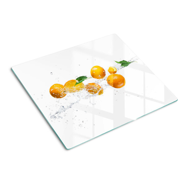 Üveg vágódeszka Citrusfélék vízzel