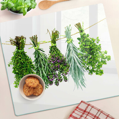 Üveg vágódeszka Szárított gyógynövények egy madzagon