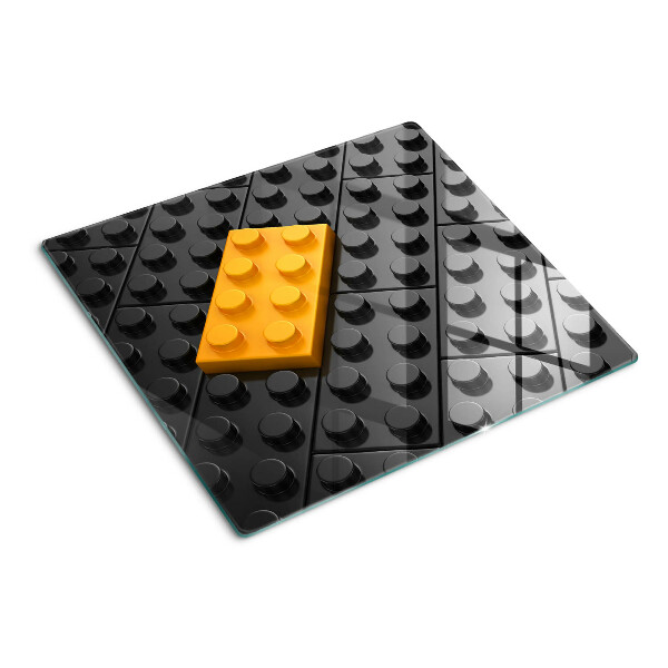 Üveg vágódeszka LEGO kockák fekete háttéren