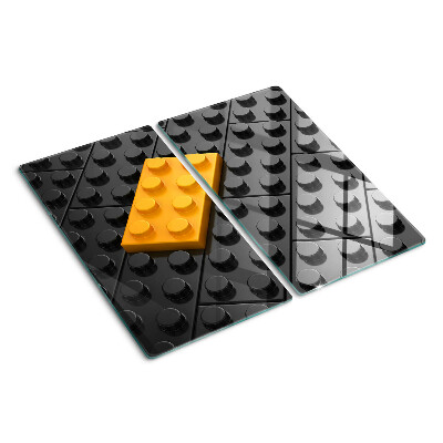 Üveg vágódeszka LEGO kockák fekete háttéren