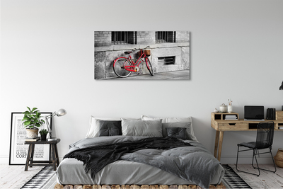 Canvas képek Piros bicikli egy kosár