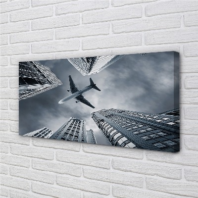 Canvas képek Város felhő repülőgép ég
