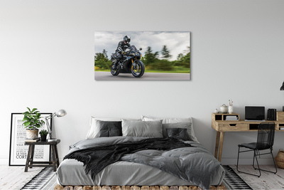 Canvas képek Motorkerékpár út felhők ég