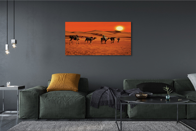 Canvas képek Tevék az emberek sivatagi nap ég
