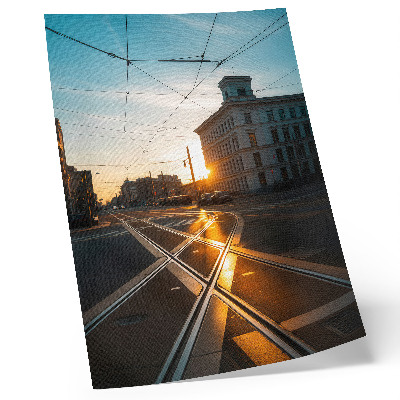 Poszter nyomtatás A lenyugvó nap a város felett építészettel