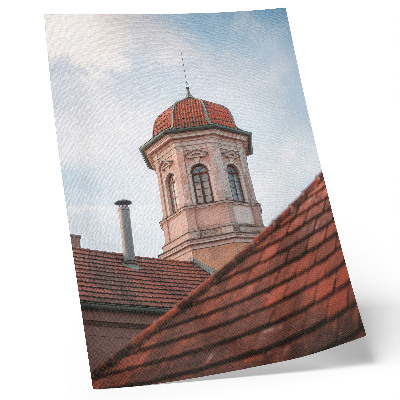 Poszter Rusztikus torony tégla tetőcserepek kék ég