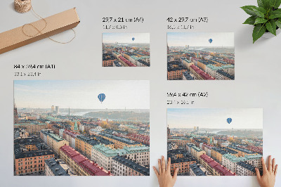 Poszter nyomtatás Színes városi léggömb épületek felett égbolt