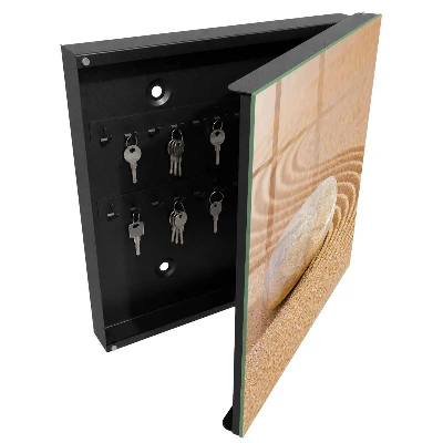 Kulcsdoboz Egy kő a homokban