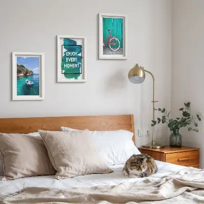 Keretezett triptichon tengerre néző kilátás hajóval, kerékpárral és inspiráló felirattal