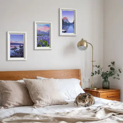 Hegyi tájak vízzel, éggel és virágmezővel keretezett triptichon