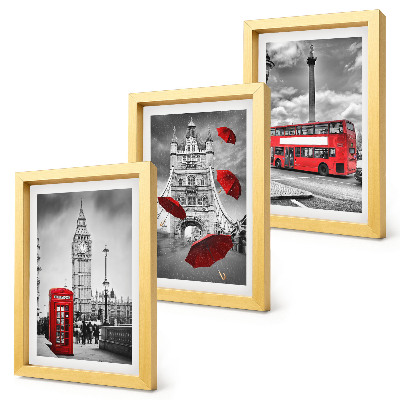 Keretezett triptichon Londoni kilátás egy piros esernyővel és egy busszal