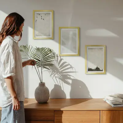 Keretezett triptichon madarak, sziklák és ecsetvonások minimalista dekoráció