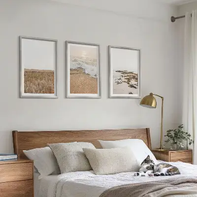 Keretezett kép szett hálószobába strand hullámok és kövek mintával