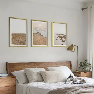 Keretezett kép szett hálószobába strand hullámok és kövek mintával